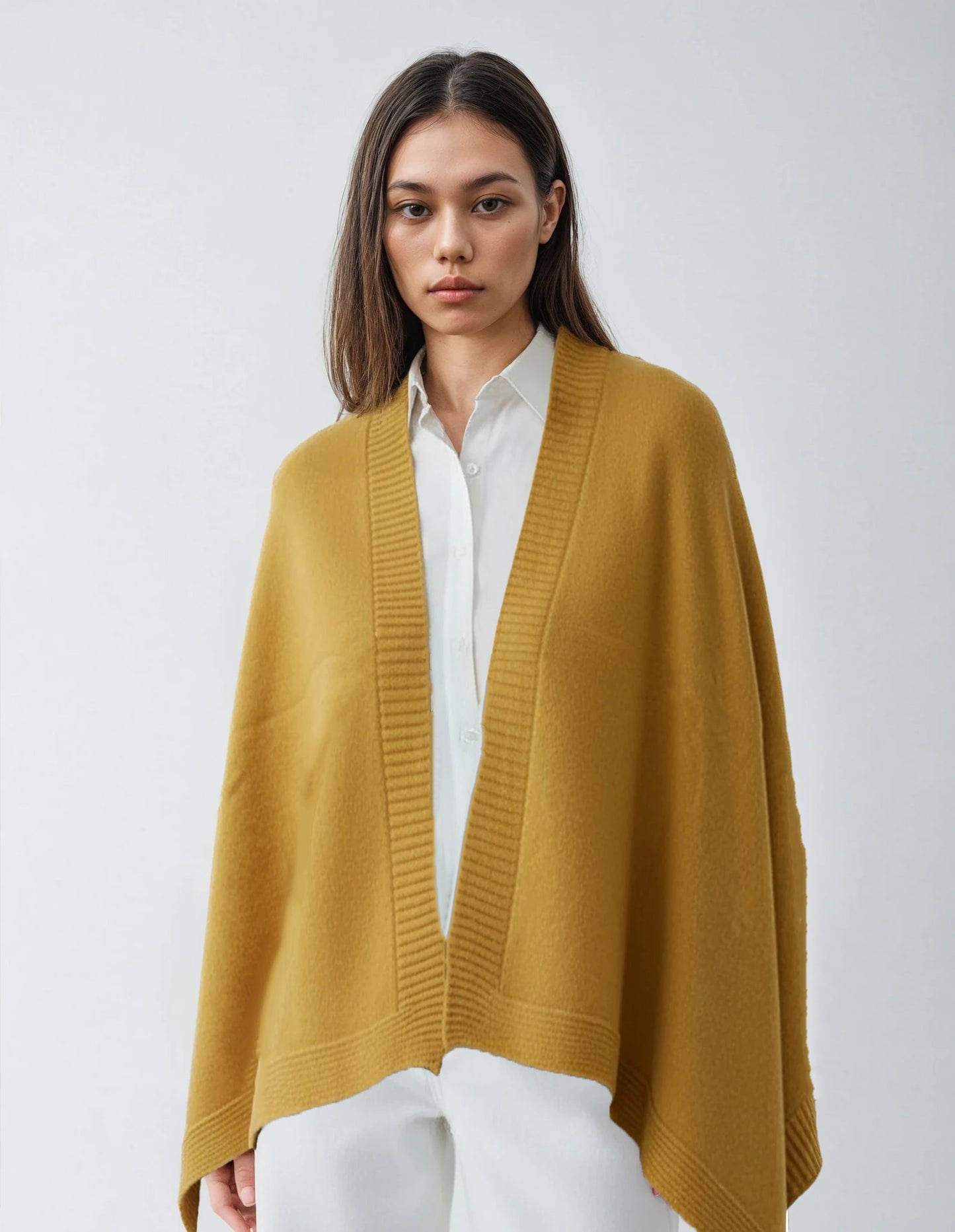 Mustard yellow wool cape, a cozy knit garment