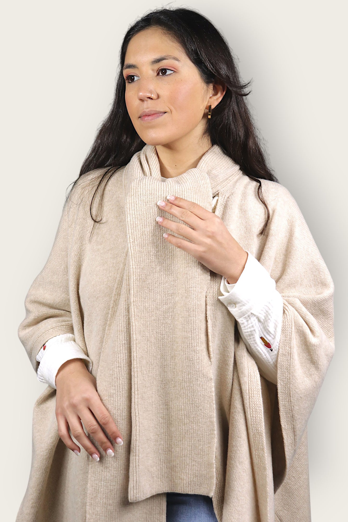 Sand colored lambswool scarf cape in pearl knit. Versatile wool cape for women