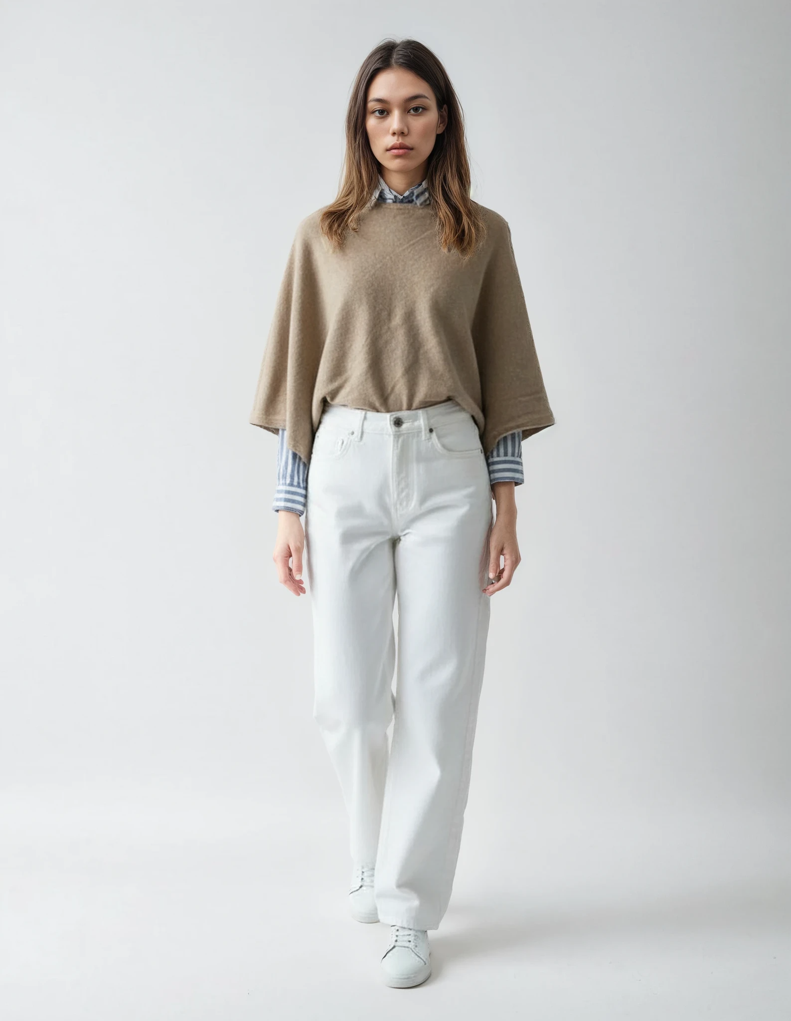 Women's bege wool poncho (one size). Versatile and flattering loose fit for easy layering in fall and winter