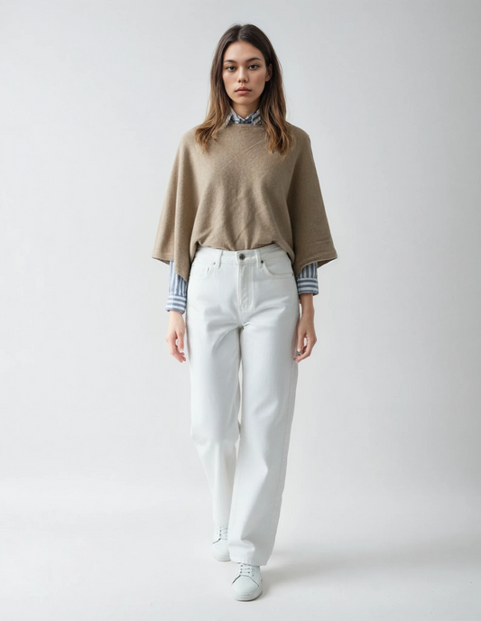 Women's bege wool poncho (one size). Versatile and flattering loose fit for easy layering in fall and winter