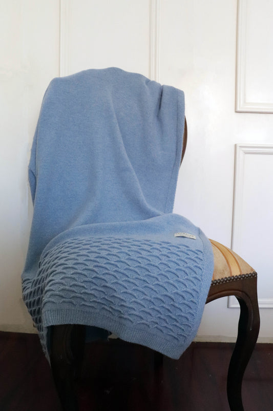 Blue lambswool waves blanket for a nursery or living room accent