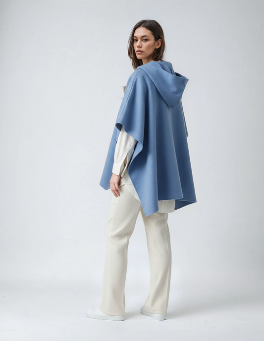 Lavender blue women's knit poncho with hood. Comfortable wool blend for casual elegance