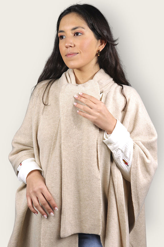 Sand colored lambswool scarf cape in pearl knit. Versatile wool cape for women